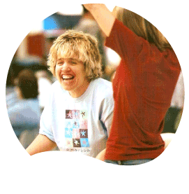 smiling girl being cheered on
